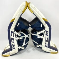 CCM Extreme Flex 5 - Used NCAA Pro Stock Goalie Pads (White/Blue/Gold) -Hockey Stick Man Shop Photo2023 06 09 11606PM