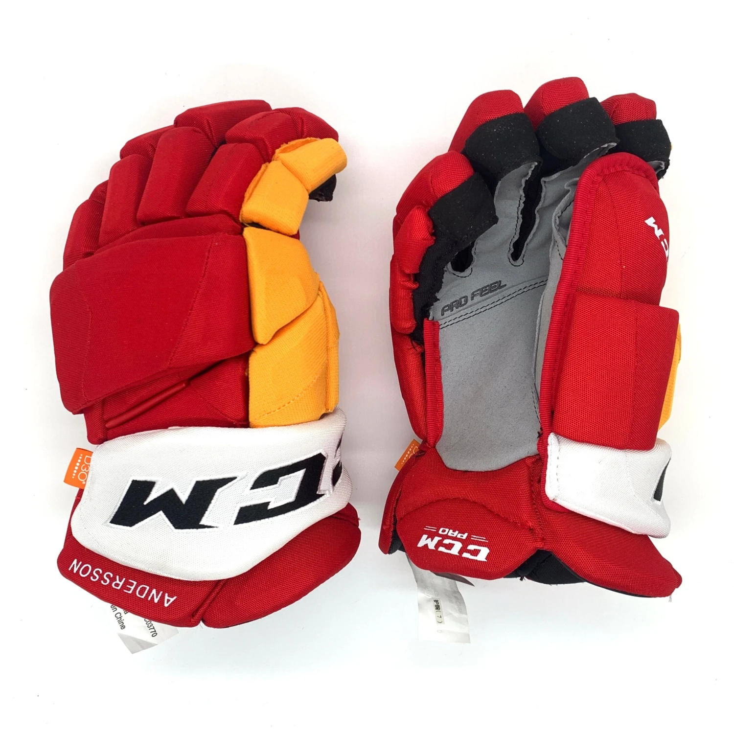 CCM HGPJS - NHL Pro Stock Glove - Rasmus Andersson (Red/Yellow/White) 1 CCM HGPJS - NHL Pro Stock Glove - Rasmus Andersson (Red/Yellow/White)